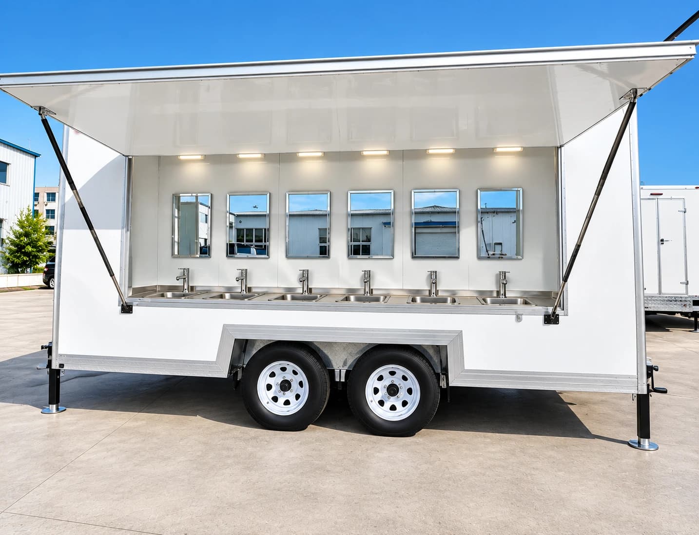 Handwashing sink trailer paired with a shower setup